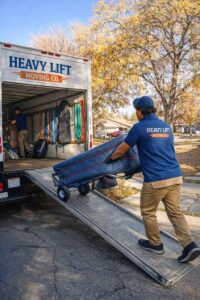 House moving services in Salt Lake City by Heavy Lift Moving Co loading furniture into a moving truck